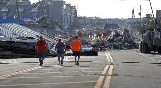 The Latest: Florida governor asks debate delay after storm The Latest: Florida governor asks debate delay after storm