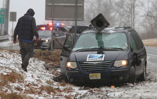 A van driving north on Route 18, approaching the Deal Road exit, slid off the road and took down a pole in Ocean Township on Tuesday, February 12, 2019.
