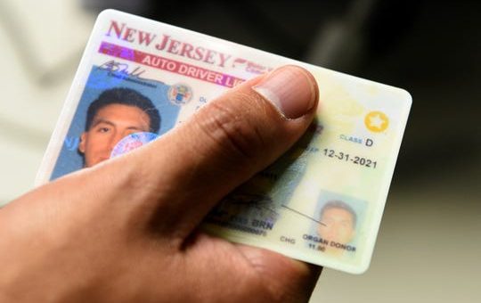 NorthJersey.com reporter Rodrigio Torrejon applies for a Real ID driver's license at the Trenton MVC on September 12, 2019. The two most obvious physical changes to the Real ID license is that it now displays a driver’s full name and has a gold star in the upper right corner.