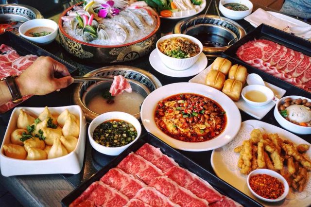 The spread at Hai Di Lao, chain of hot pot restaurants founded in Jianyang, Chengdu, Sichuan Province, China, in 1994.