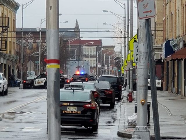 Police respond to an active shooter scene at Martin Luther King Drive and Bidwell Avenue. (Josh Rosario | The Jersey Journal)