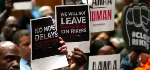 Criminal justice reform advocates demand the closing of all jails on Rikers Island during a community board meeting in The Bronx, May 23, 2019.