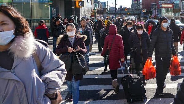People in Flushing, Queens, on Wednesday. The health authorities in New York City have announced the second suspected case of the new coronavirus. 