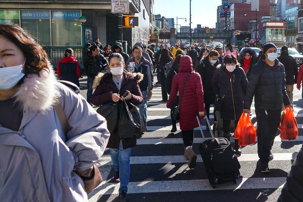 People in Flushing, Queens, on Wednesday. The health authorities in New York City have announced the second suspected case of the new coronavirus.