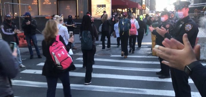 Coronavirus NYC: NYPD applauds doctors, nurses traveling home ...